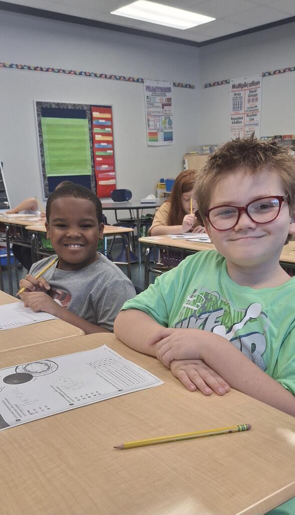 Two minds are better than one! Students in Mrs. Neal's 3rd grade class love working with a buddy.