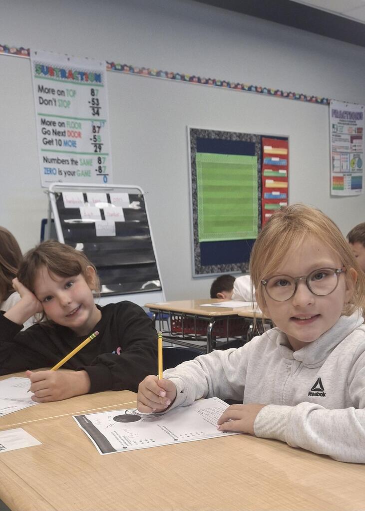 Two minds are better than one! Students in Mrs. Neal's 3rd grade class love working with a buddy.