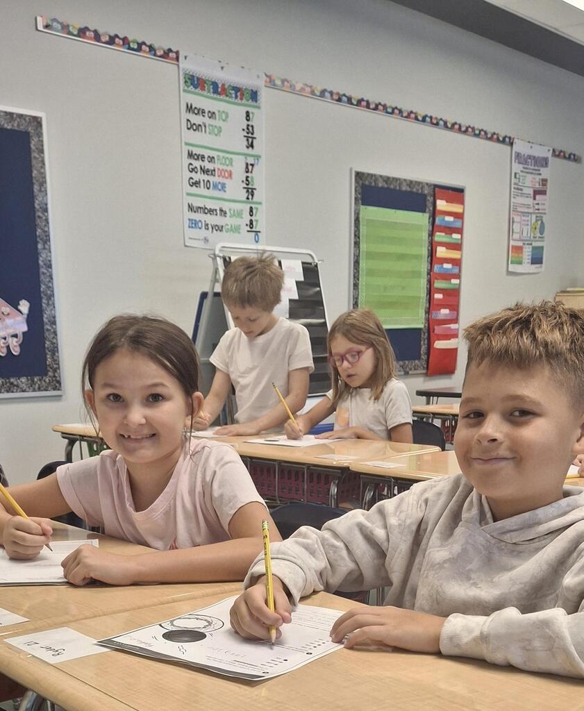 Two minds are better than one! Students in Mrs. Neal's 3rd grade class love working with a buddy.