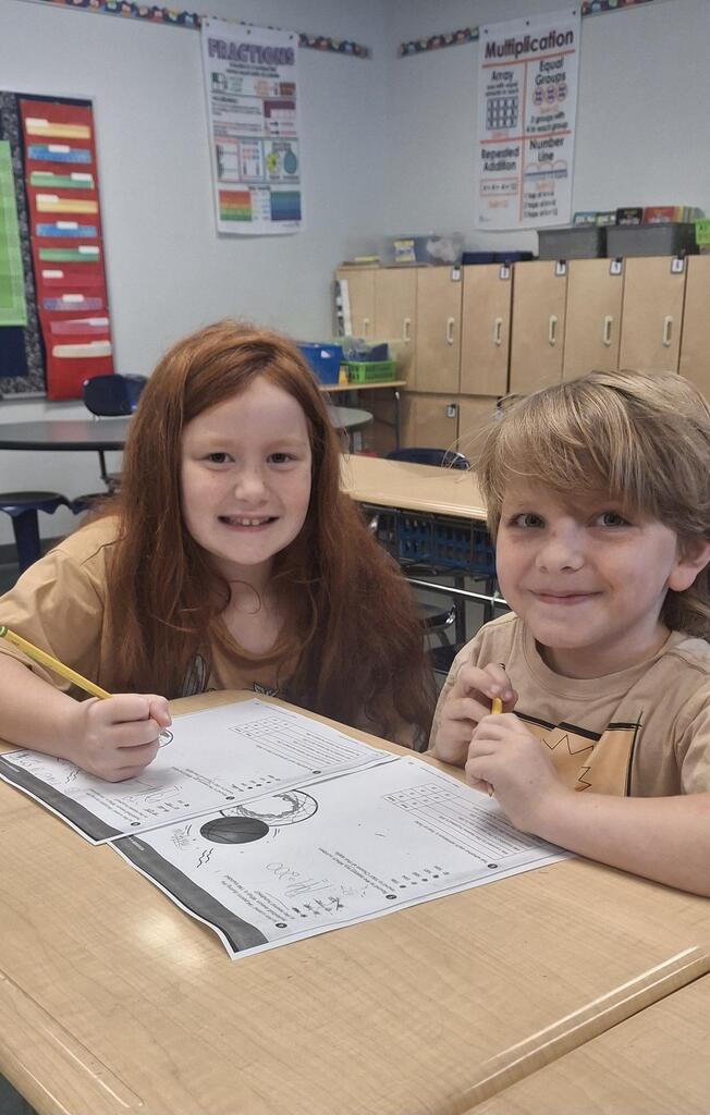 Two minds are better than one! Students in Mrs. Neal's 3rd grade class love working with a buddy.