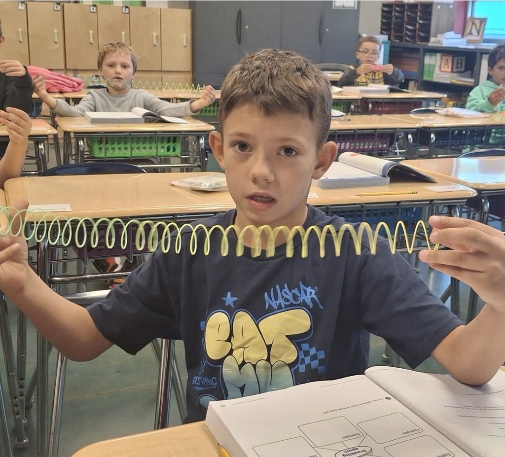 Students in Ms. Thornton's 3rd grade class are using Slinkies to practice breaking apart 3-digit numbers. What a fun way to learn about expanded form!