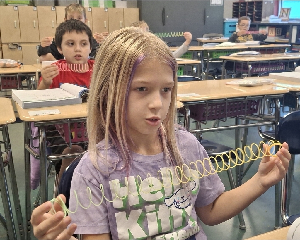 Students in Ms. Thornton's 3rd grade class are using Slinkies to practice breaking apart 3-digit numbers. What a fun way to learn about expanded form!