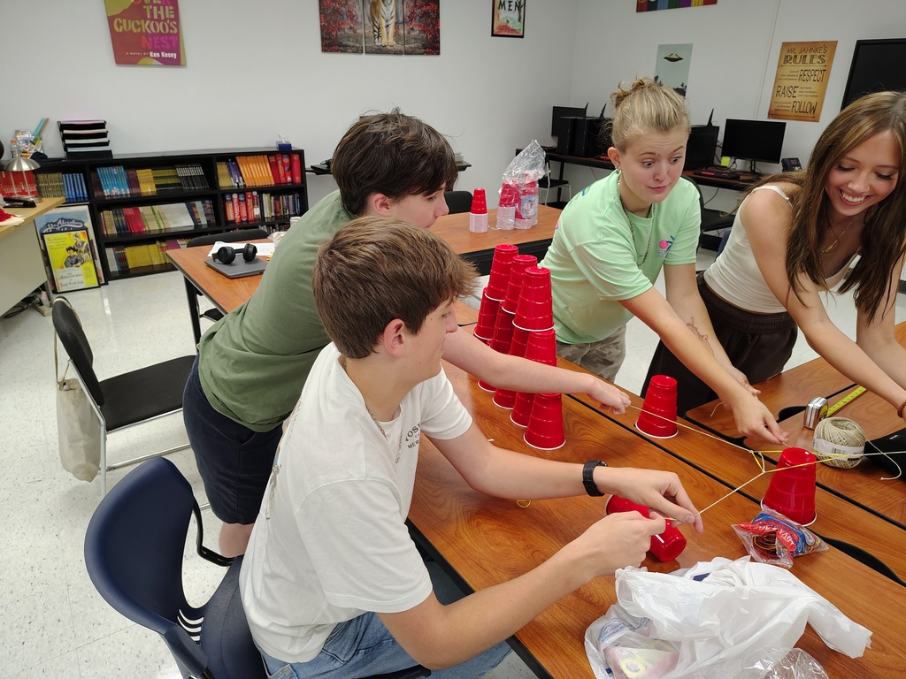 Students in American Literature work on a project