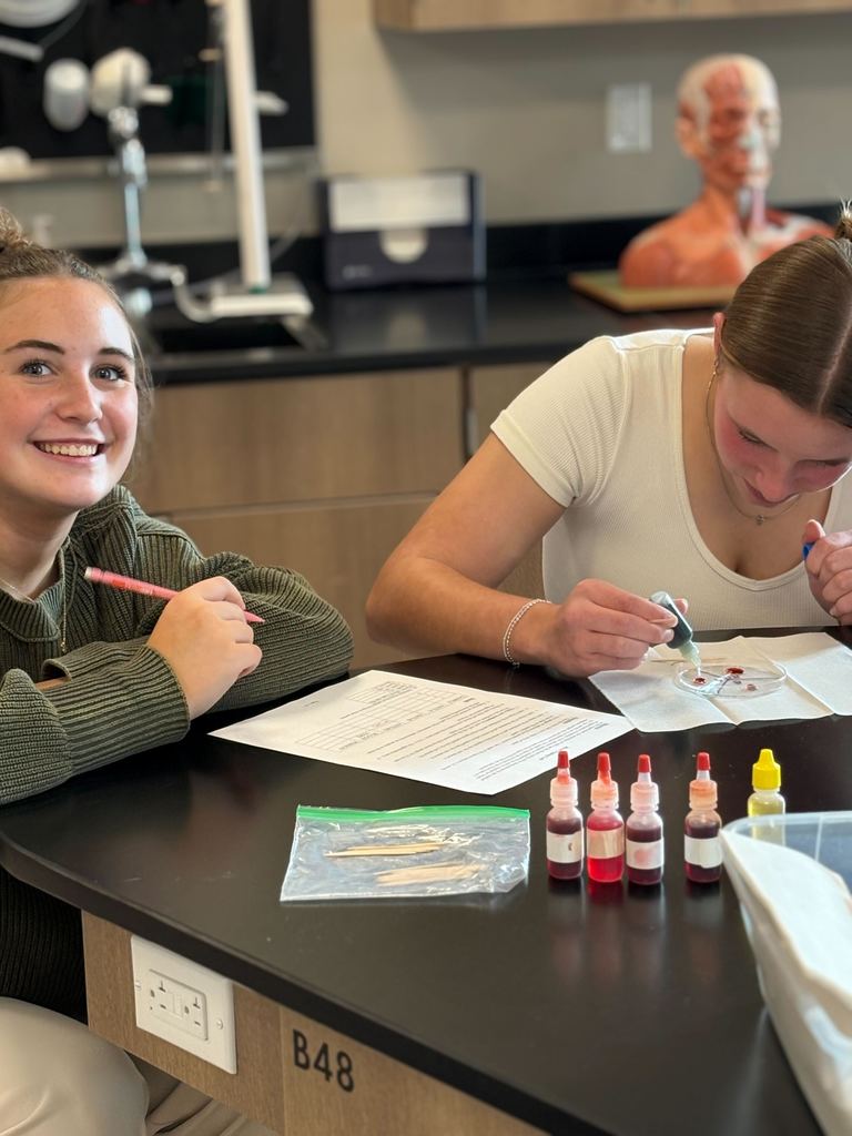 MECHS students identifying blood types.