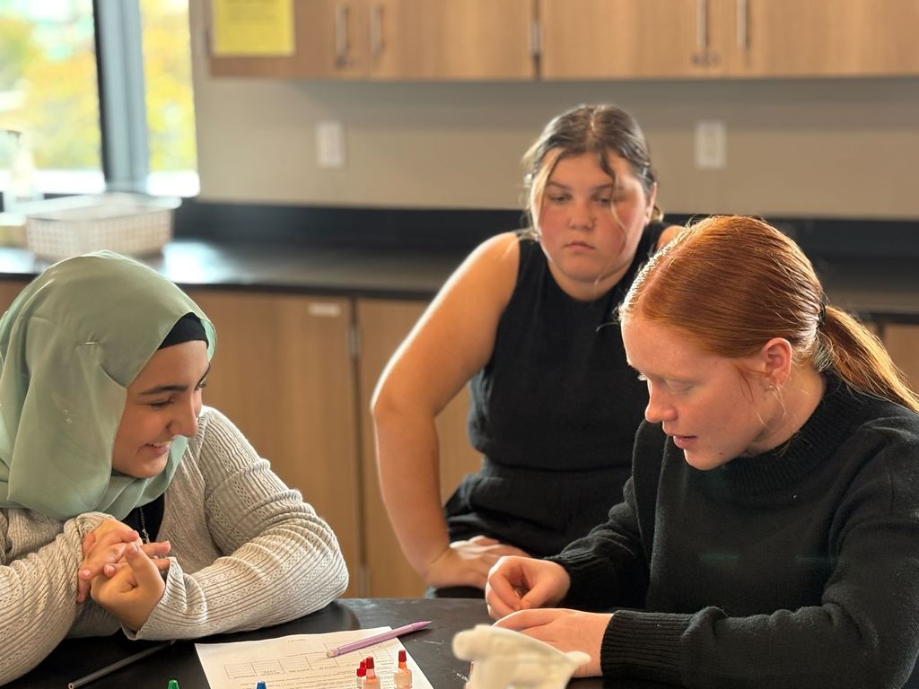 MECHS students identifying blood types.