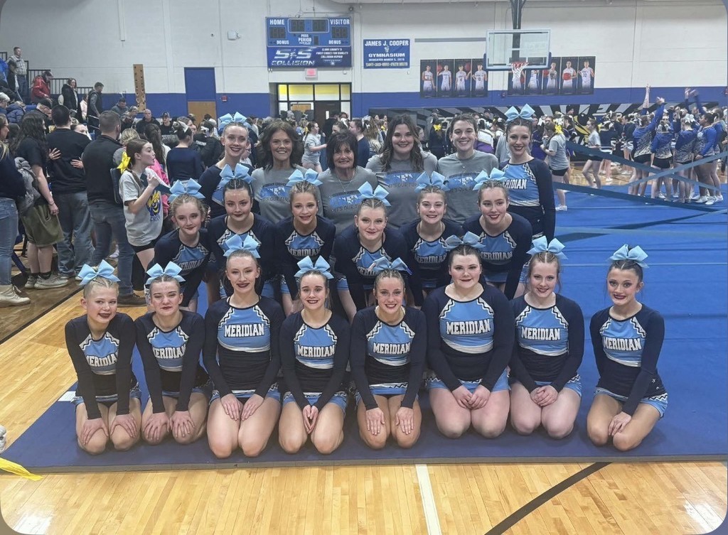 MECHS Competitive Cheer Team posing for a photo after their last competition where they took 1st place. 