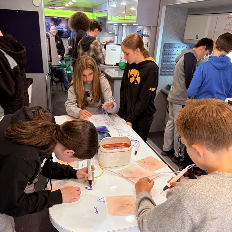 students working on activities on the STEM explorer. 