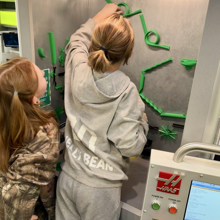 Students creating a working marble run.