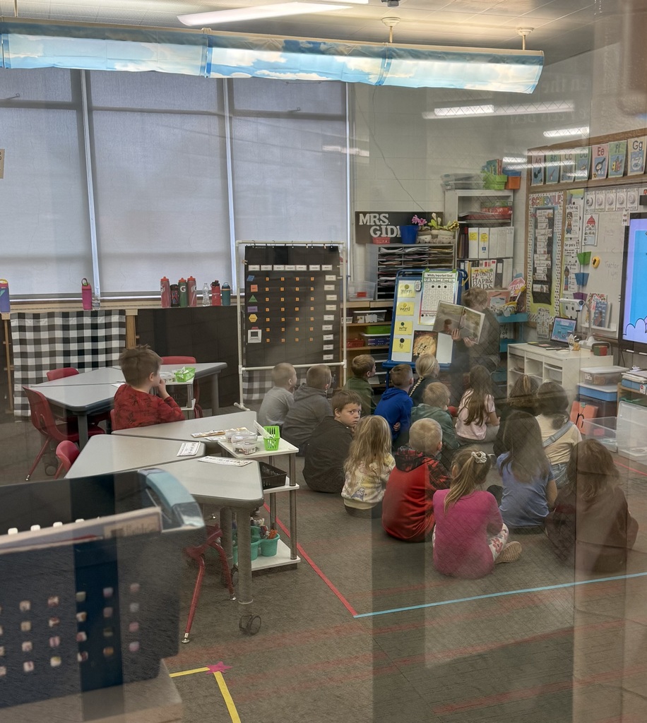 MJHS reads to HES for Drop Everything and Read Day