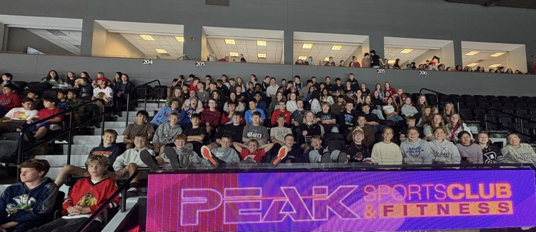 8th grade class at the IceHogs game!