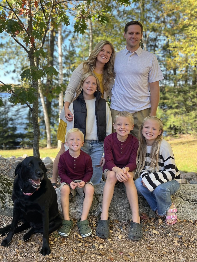 Matt Weberpal and his family with black dog