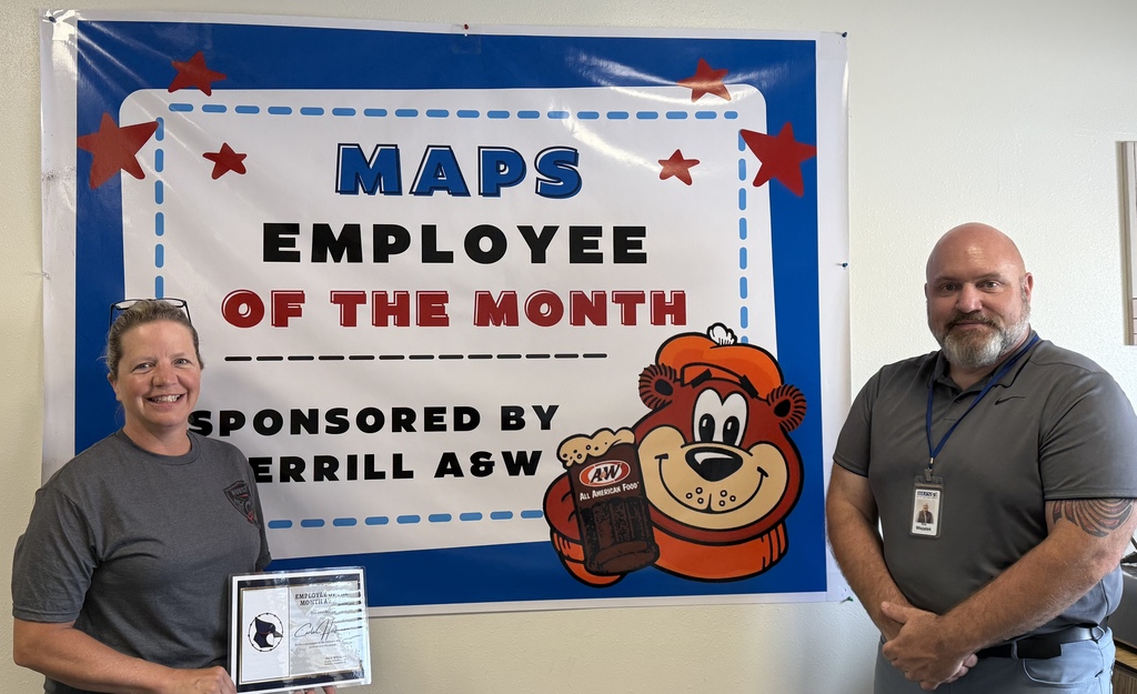 Carla Halfmann Custodial Employee of the Month pictured with Nick Wszalek