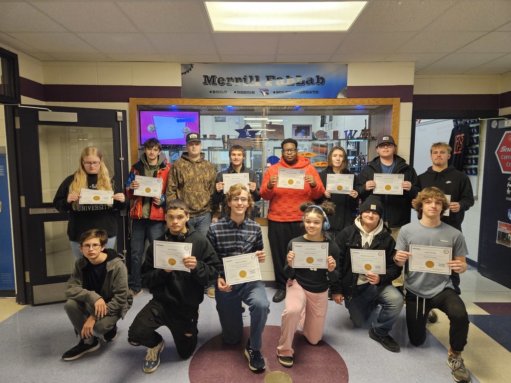 Group of students holding certificates  who earned a nationally recognized 3D printing certification through NC3.