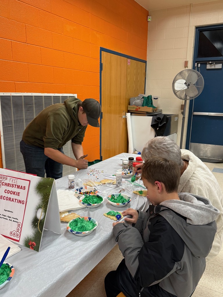 Joe helps with cookies
