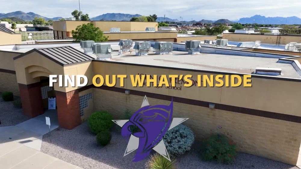 An drone shot of a school with the words "Find Out What's Inside" InsideMPS.com and a graphic of a falcon logo in the front.