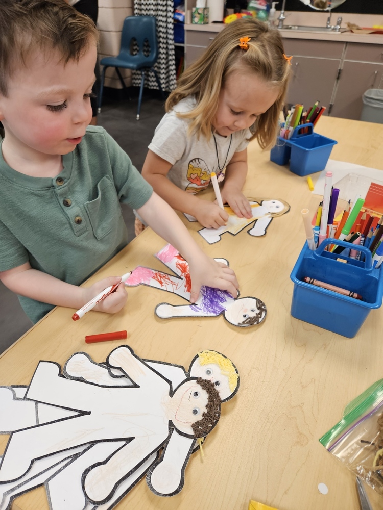 Kindergarten students coloring