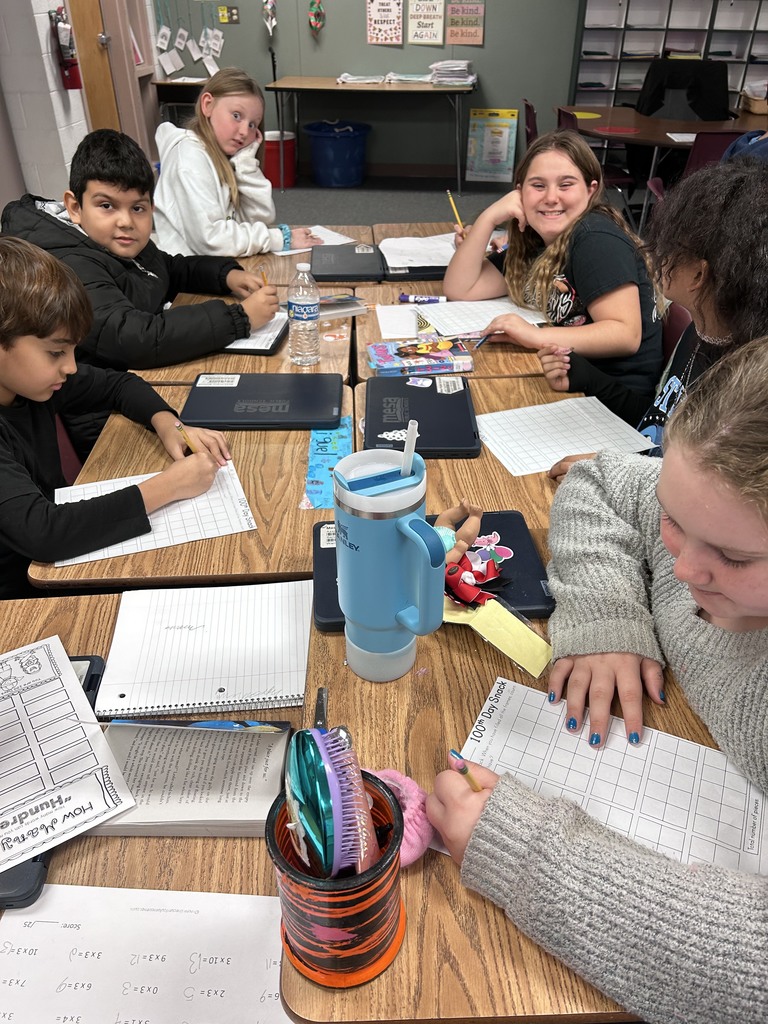 a group of students doing school work