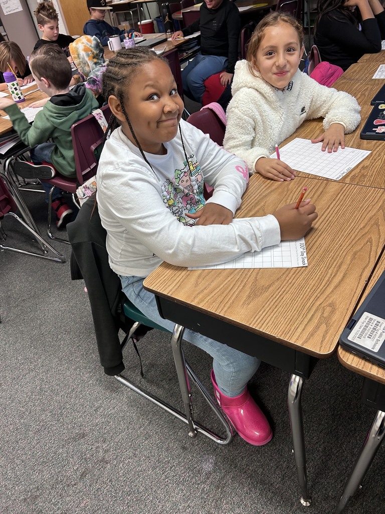 two girls doing school work