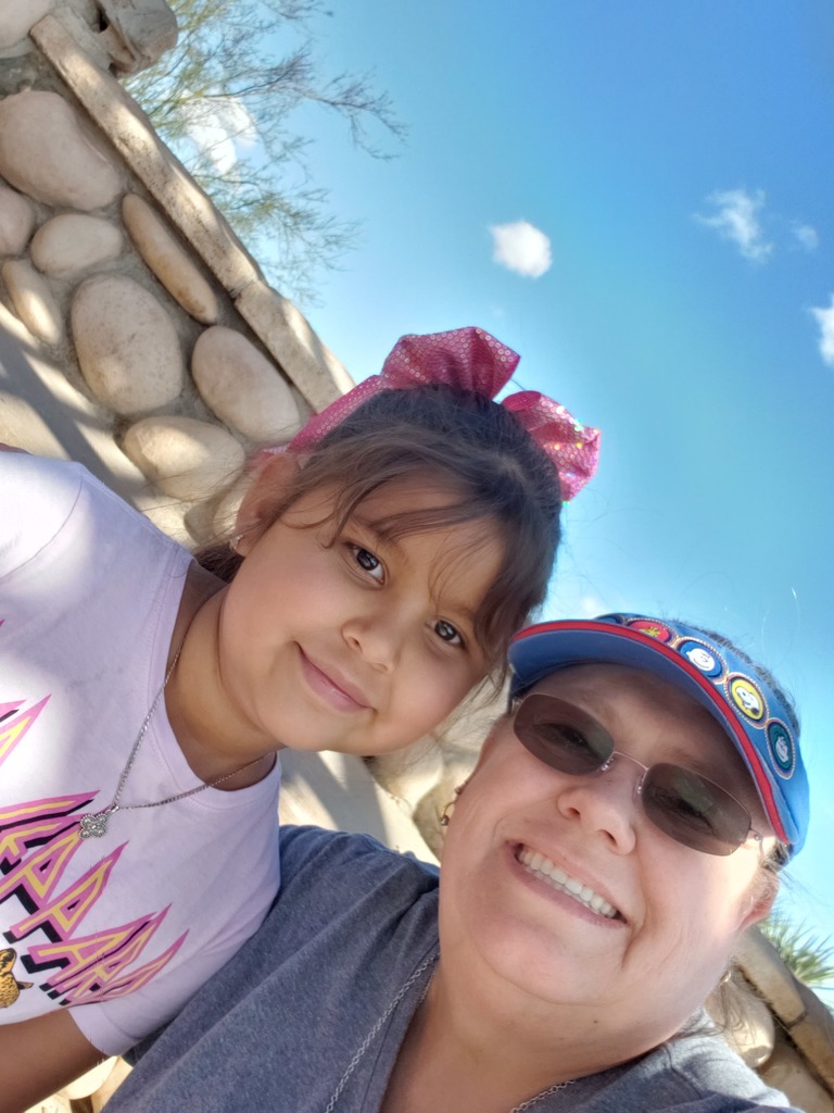 teacher and student smiling