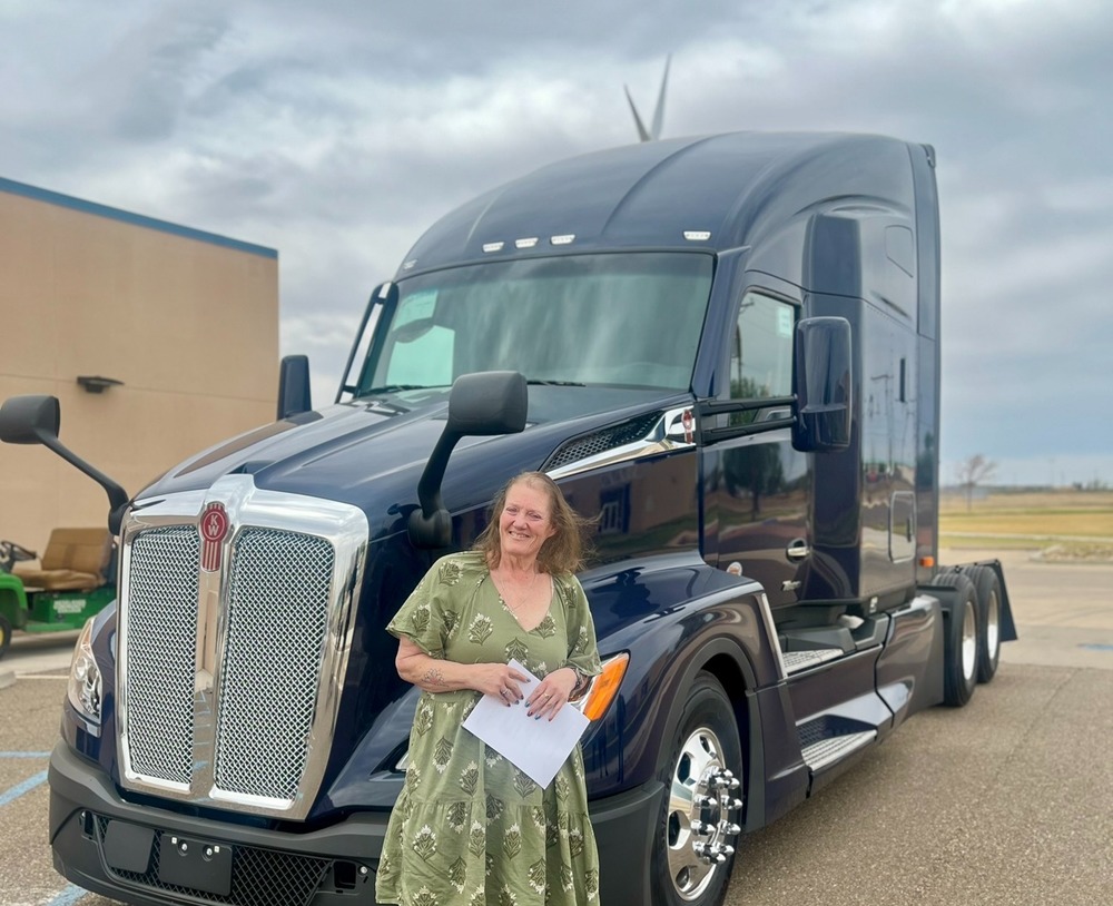 Mesalands staff in front of new Semi