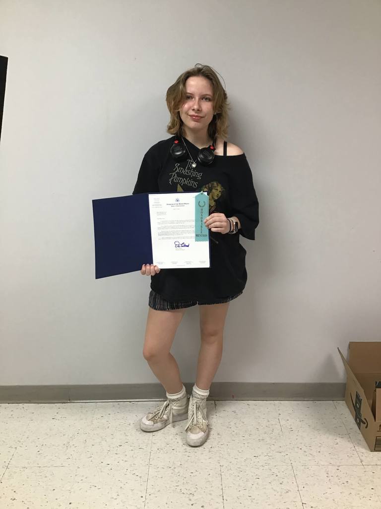 Samantha Ayers with her award from the Congressional show.