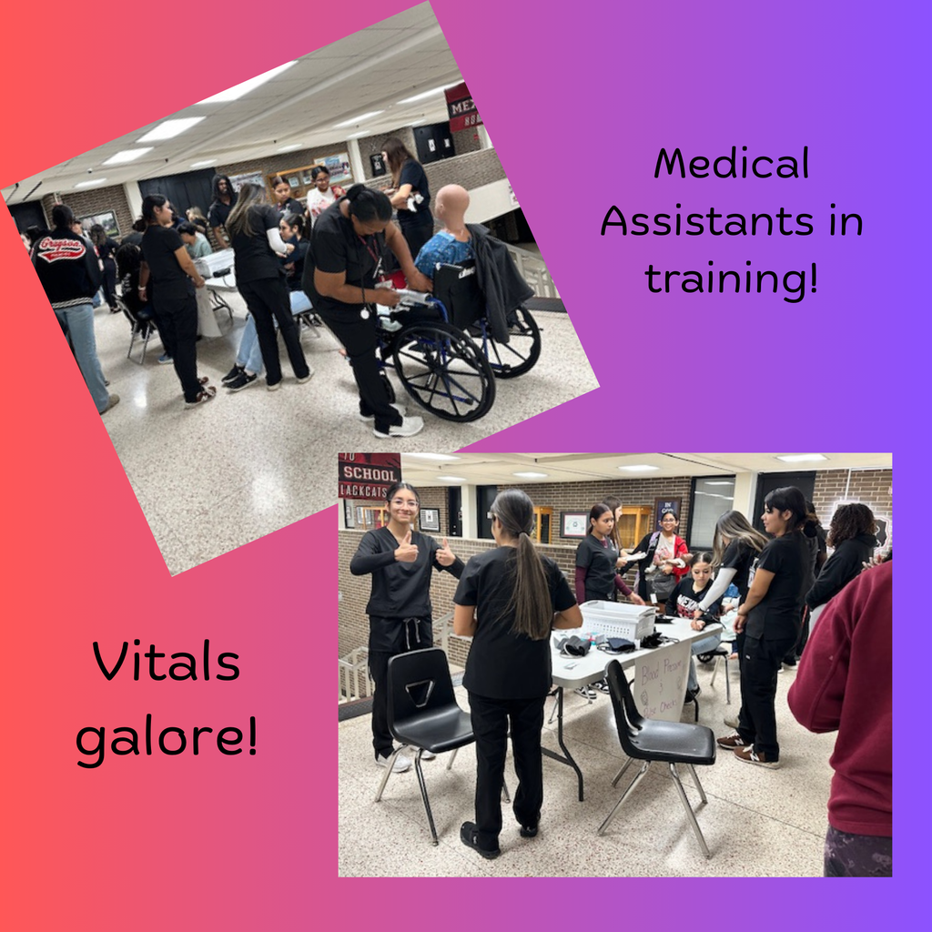 Medical assistant students taking vital signs
