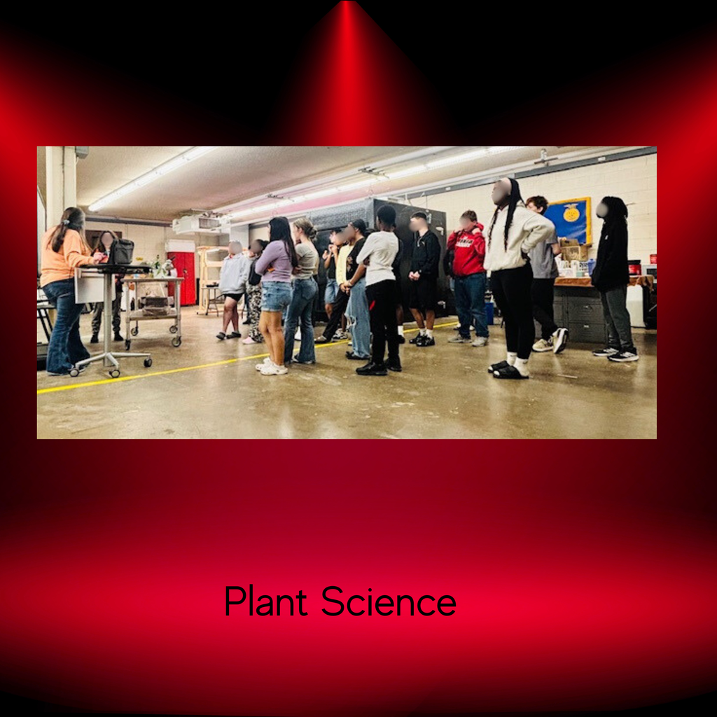 students listening to plant science presentation