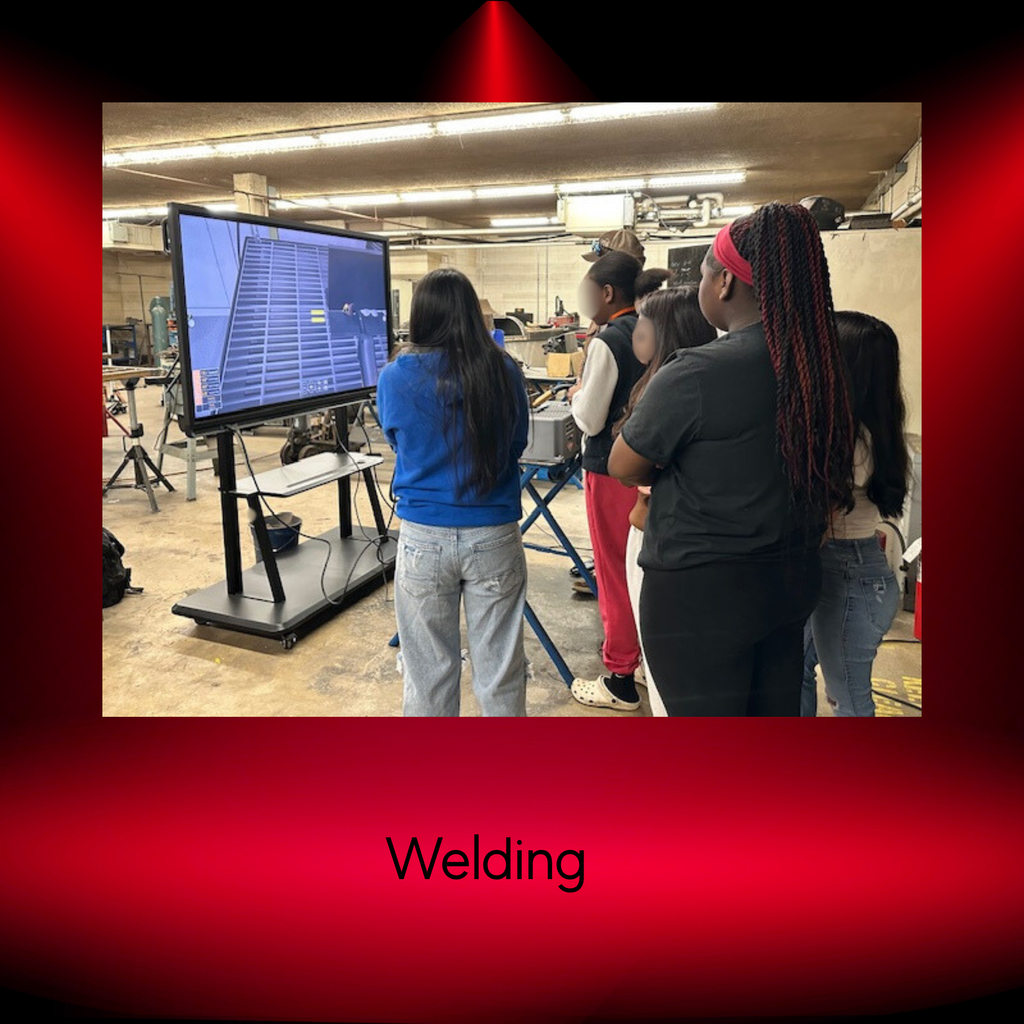 students watching a demonstration in welding presentation
