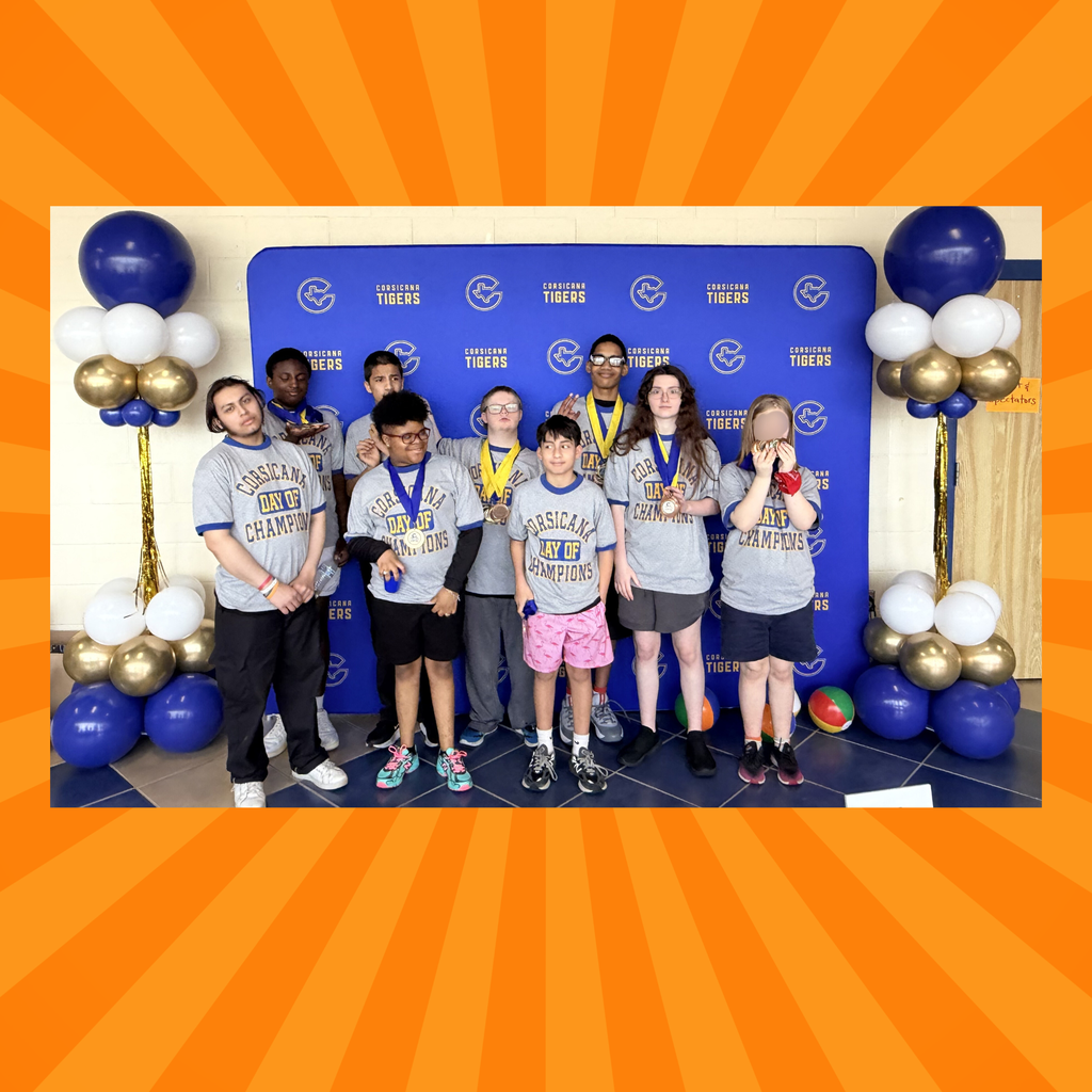 group of students showing off medals