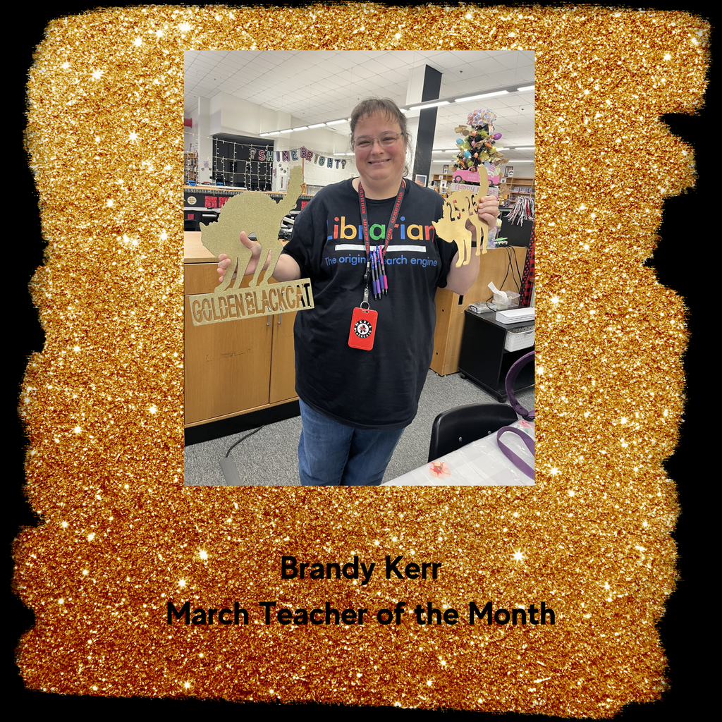 Brandy Kerr holding blackcat award