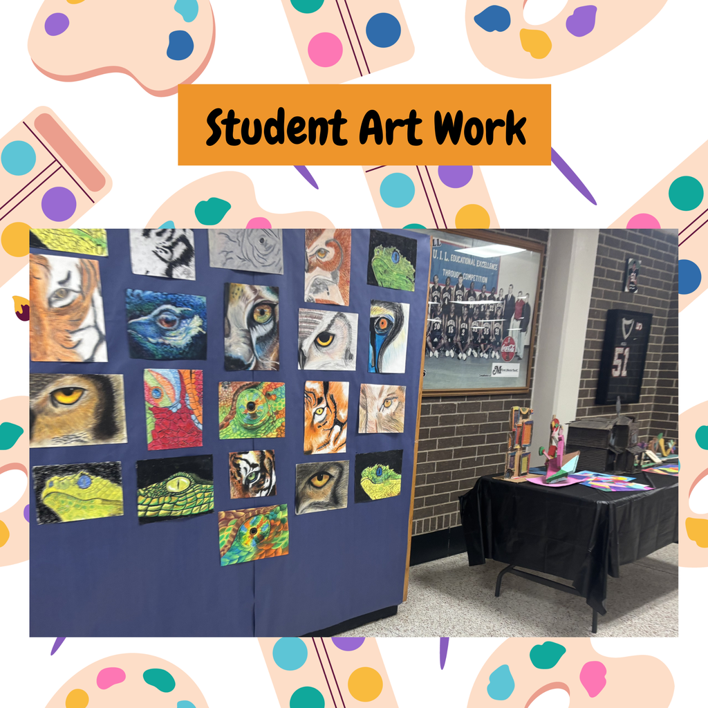 Display of student artwork on a wall, featuring various animal paintings. A black table with art supplies is nearby.