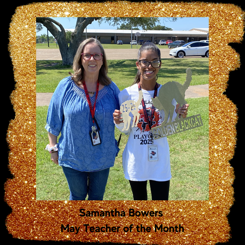 May's teacher of the month posing outside