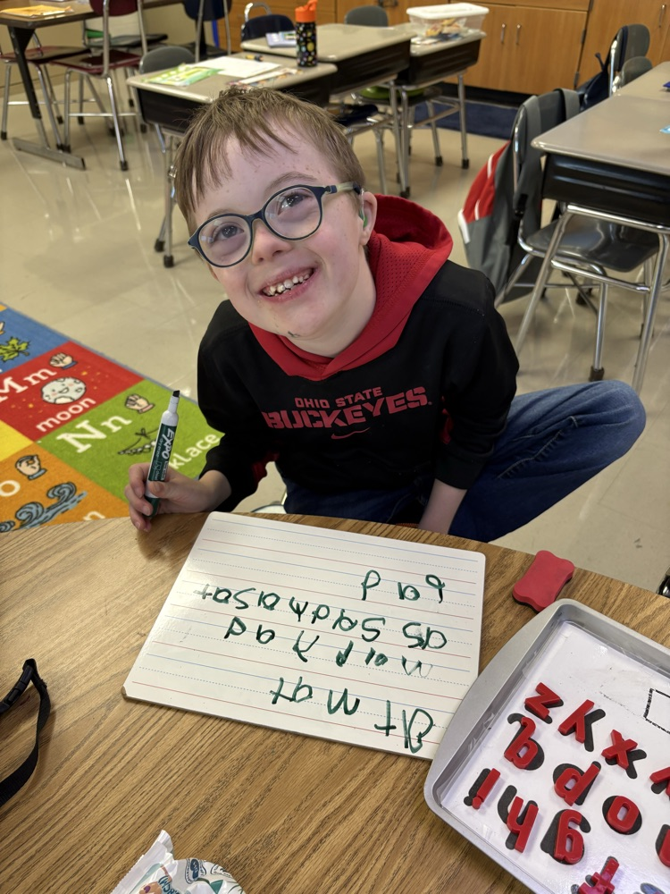 Miami East kiddos using UFLI for phonics/reading instruction and AAC device.