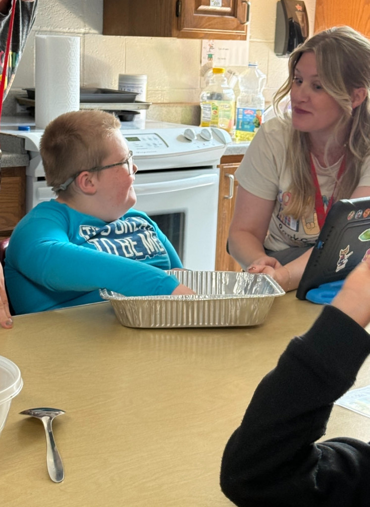 Mrs. Durbin’s class enjoyed learning about a hot air balloon festival last week. They did a science experiment with a plastic grocery bag and a hairdryer to learn how a hot air balloon flies, and they did a hot air balloon craft to help decorate their classroom. They ended the week baking a cake to celebrate two birthdays!