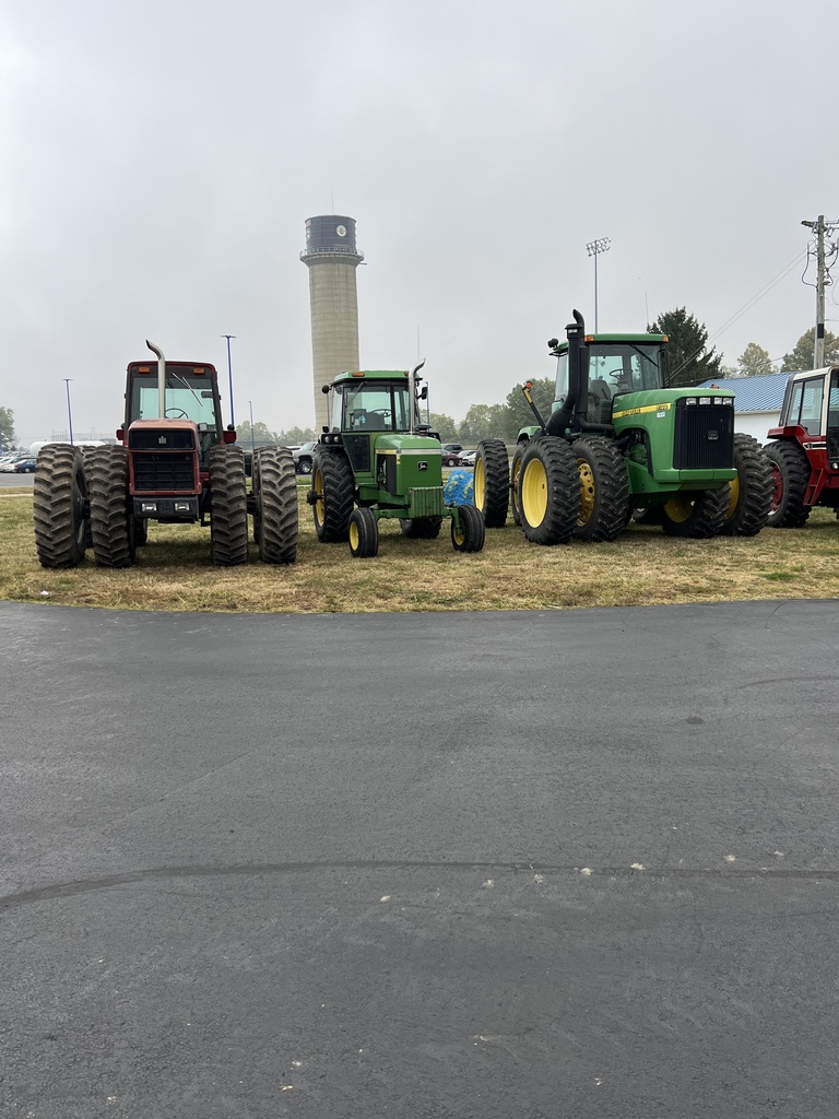 Tractors the students drove to school.