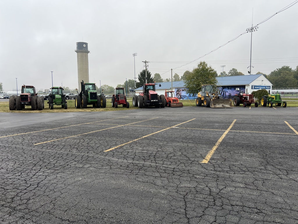 Tractors the students drove to school.