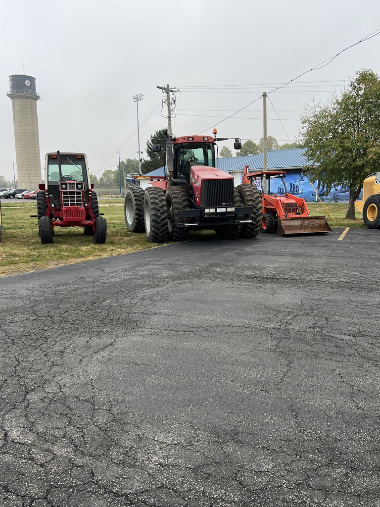 Tractors the students drove to school.