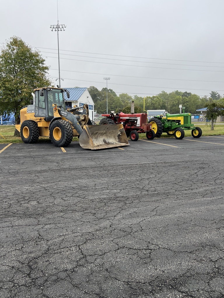 Tractors the students drove to school.
