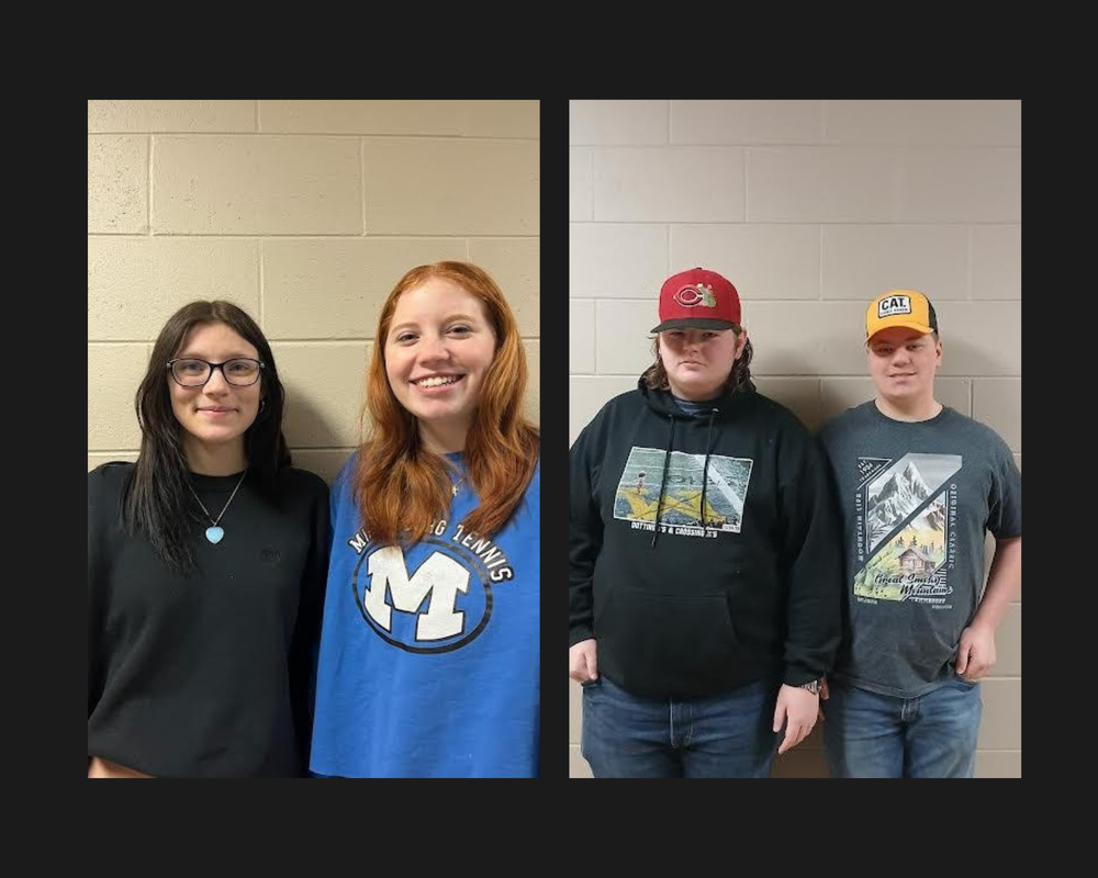 4 students on cinderblock backdrop posing for FFA State photo