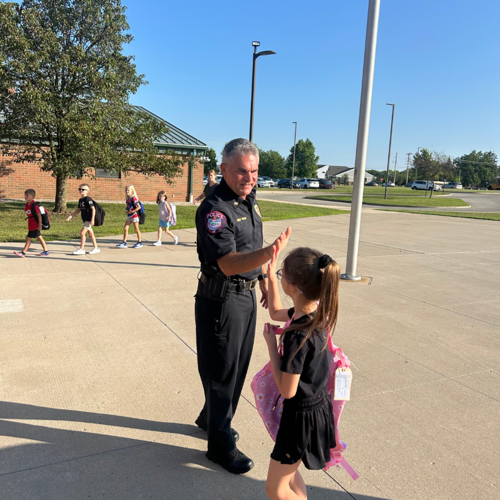 Chief Brem Greeting Students on First Day