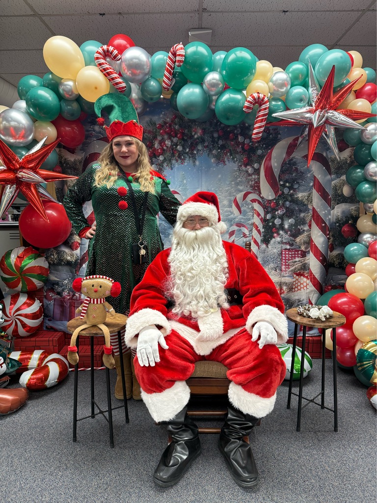 Santa and Hillary - Principal