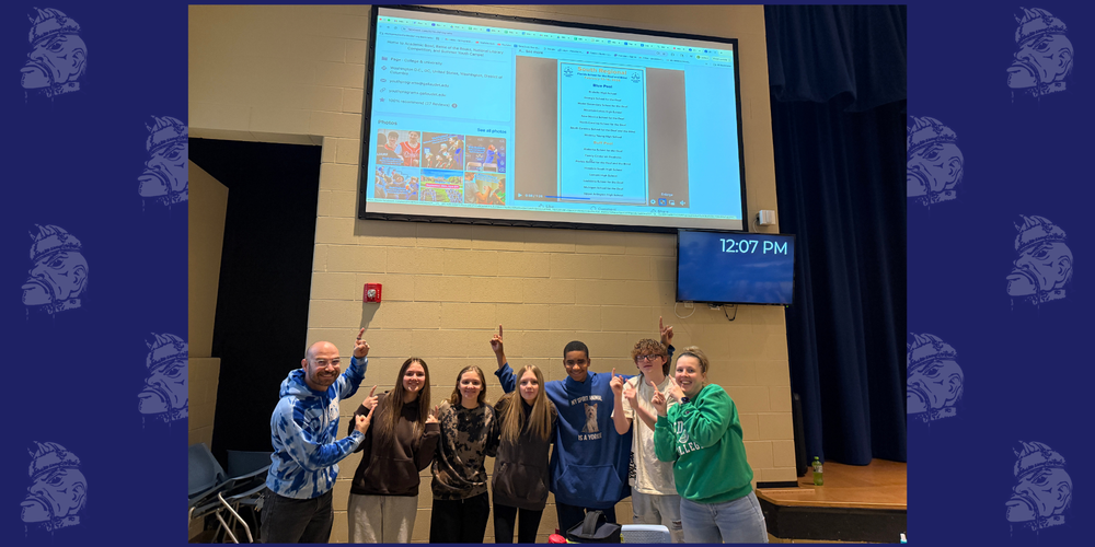 AB team pointing at the standings screen