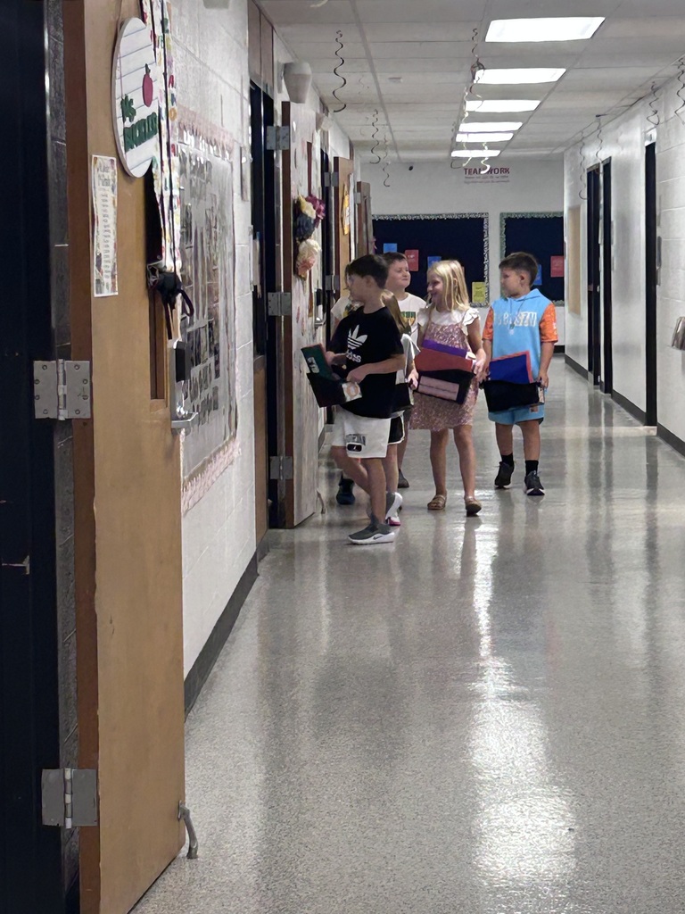 Second grade students switching classes