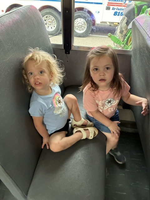 Two children on school bus