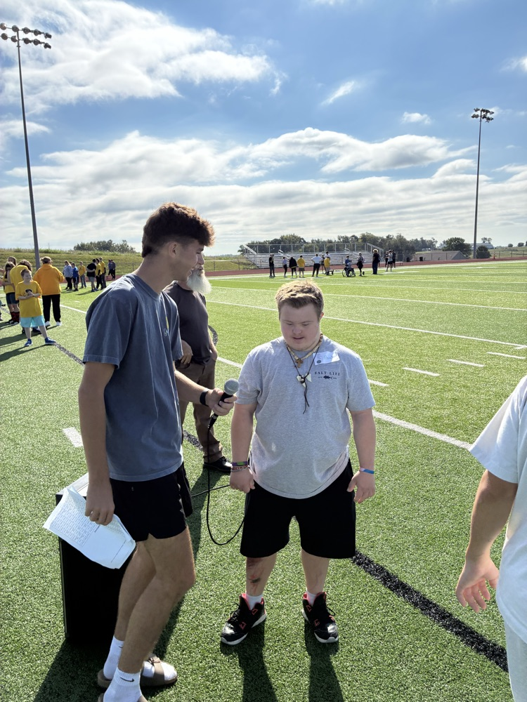 students playing football
