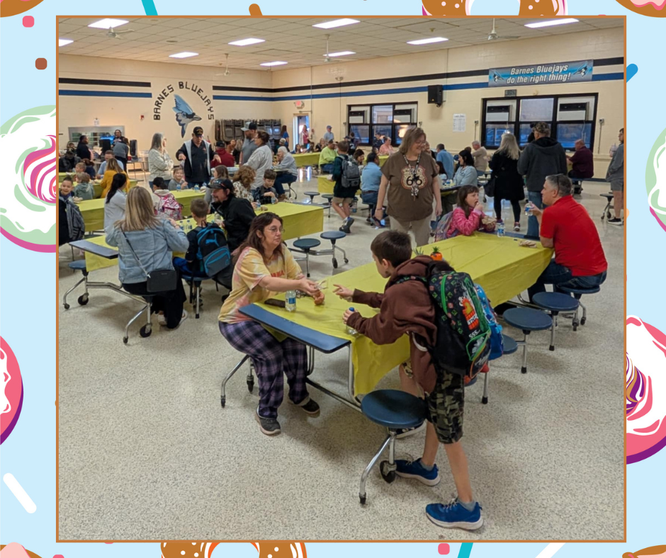 Picture of students and teachers at Donuts for Grownups.  