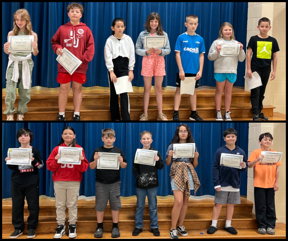 Image of students with their honor roll awards.