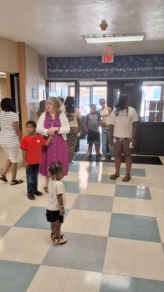 Mrs. Chris helping PVE families