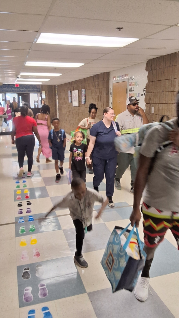 Families taking students up the hill