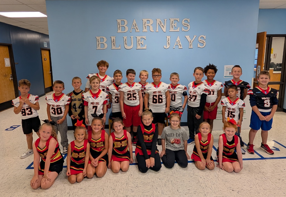 Picture of students wearing their Mid-Del uniforms.